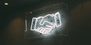 shaking hands Importance of Trust article header